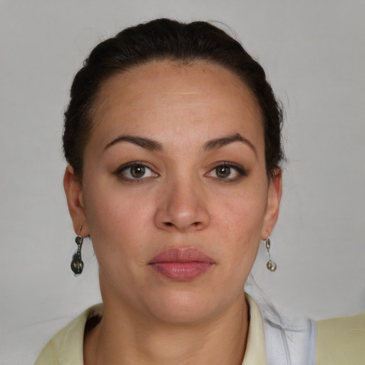 Neutral latino young-adult female with short  brown hair and brown eyes