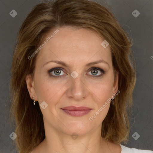 Joyful white adult female with medium  brown hair and grey eyes