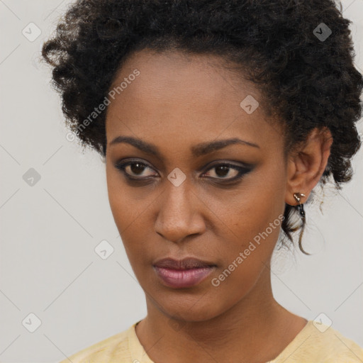 Neutral black young-adult female with short  brown hair and brown eyes