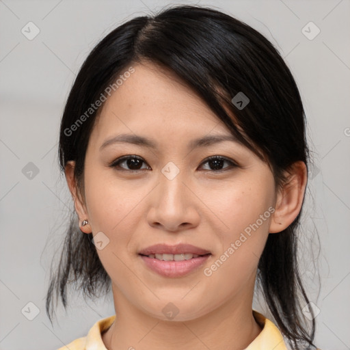 Joyful asian young-adult female with medium  brown hair and brown eyes