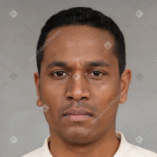 Neutral latino young-adult male with short  black hair and brown eyes