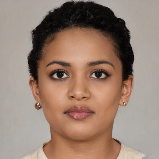 Neutral latino young-adult female with short  black hair and brown eyes