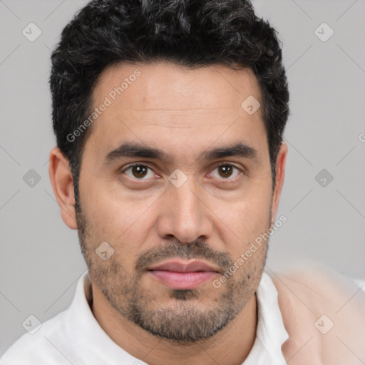 Joyful white young-adult male with short  black hair and brown eyes