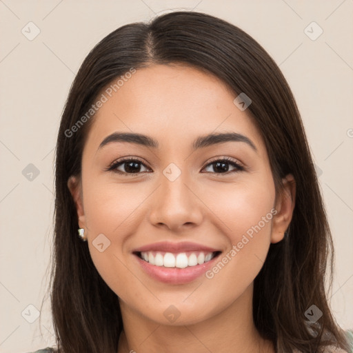 Joyful white young-adult female with long  brown hair and brown eyes