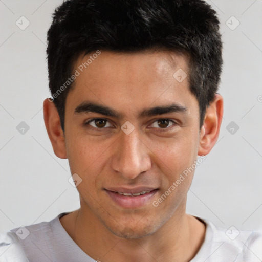 Joyful white young-adult male with short  black hair and brown eyes