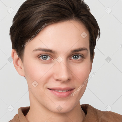 Joyful white young-adult female with short  brown hair and grey eyes