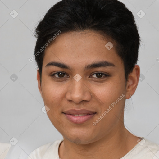 Joyful latino young-adult female with short  brown hair and brown eyes