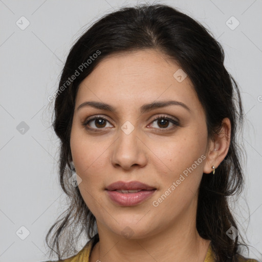 Joyful white young-adult female with long  brown hair and brown eyes