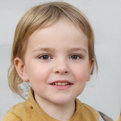 Joyful white child female with medium  brown hair and blue eyes