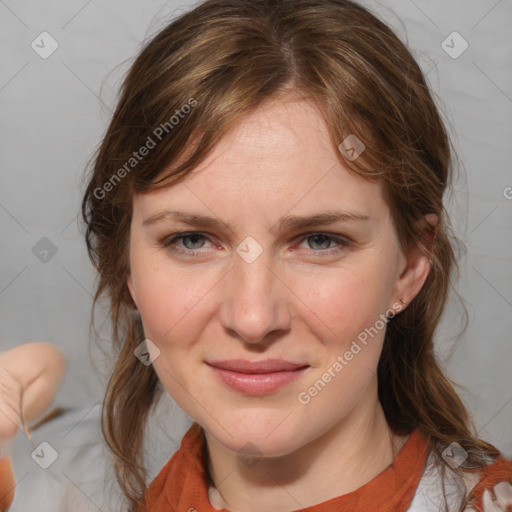 Joyful white young-adult female with medium  brown hair and blue eyes