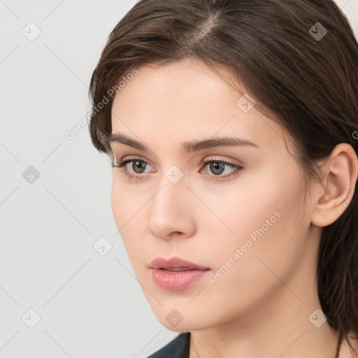 Neutral white young-adult female with medium  brown hair and brown eyes