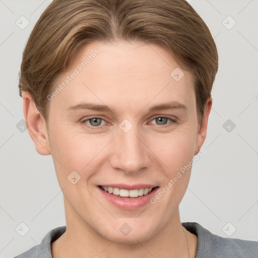 Joyful white young-adult female with short  brown hair and grey eyes