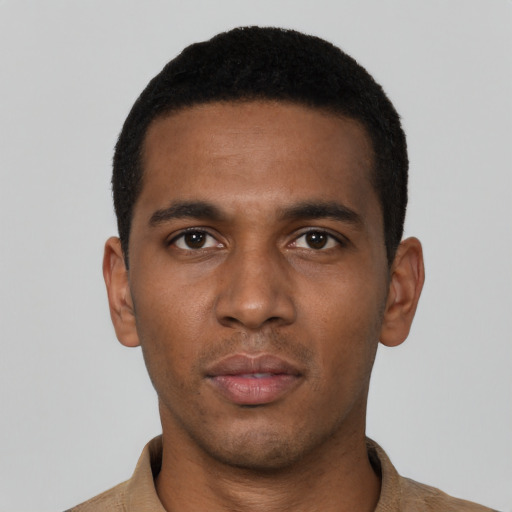 Neutral black young-adult male with short  black hair and brown eyes