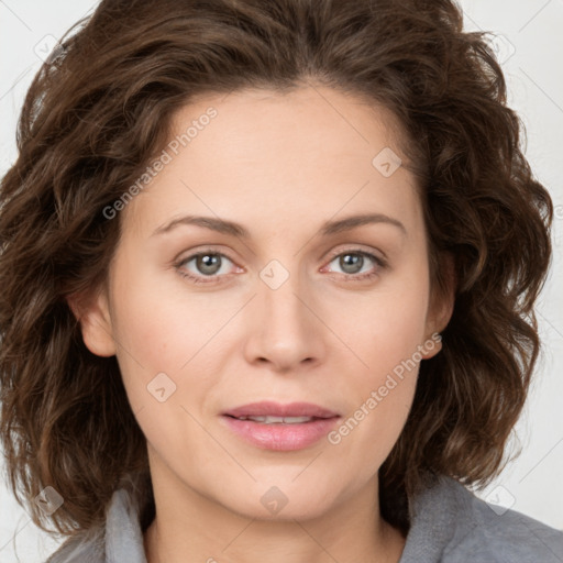 Joyful white young-adult female with medium  brown hair and green eyes