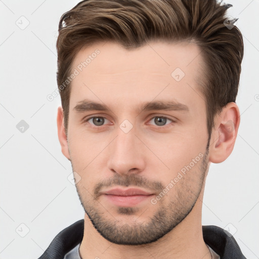 Neutral white young-adult male with short  brown hair and brown eyes