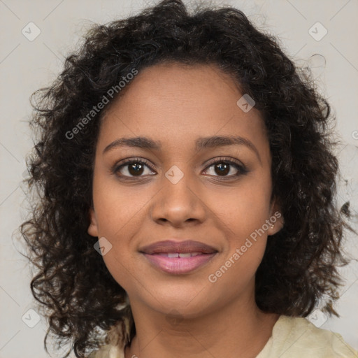 Joyful black young-adult female with medium  brown hair and brown eyes