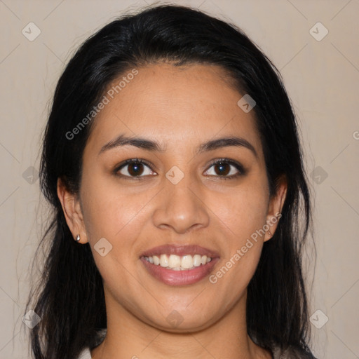 Joyful latino young-adult female with medium  brown hair and brown eyes