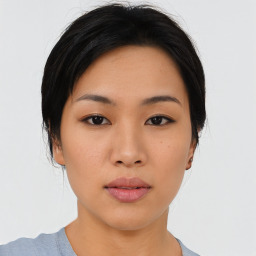 Neutral asian young-adult female with medium  black hair and brown eyes