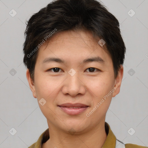 Joyful asian young-adult female with short  brown hair and brown eyes