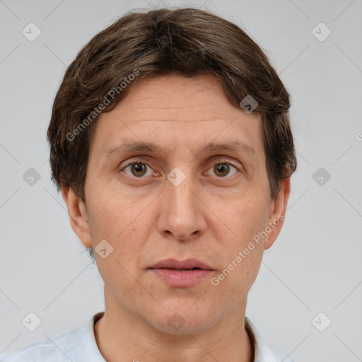 Joyful white adult male with short  brown hair and grey eyes