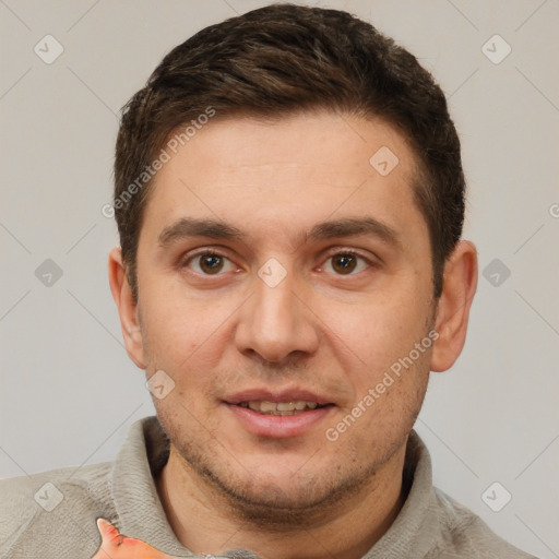 Joyful white adult male with short  brown hair and brown eyes