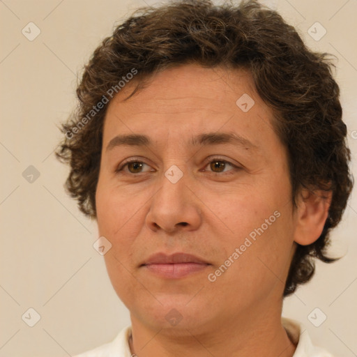 Joyful white adult female with short  brown hair and brown eyes