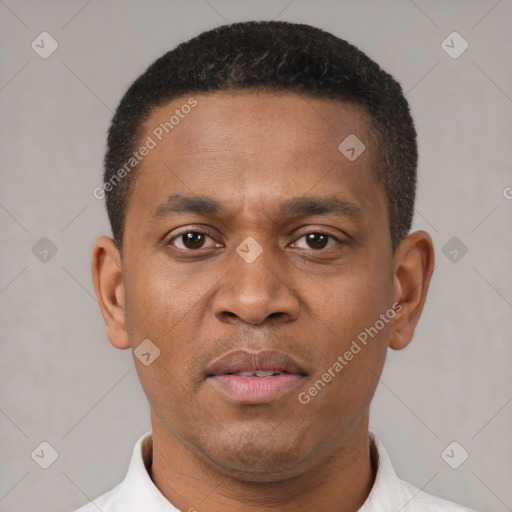 Neutral black young-adult male with short  brown hair and brown eyes