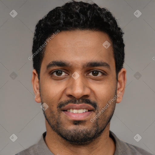 Joyful latino young-adult male with short  black hair and brown eyes