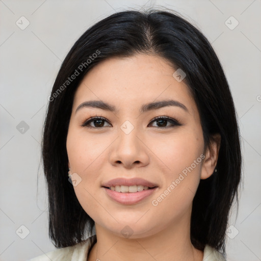 Joyful asian young-adult female with medium  black hair and brown eyes