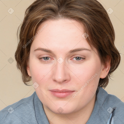 Joyful white young-adult female with medium  brown hair and blue eyes