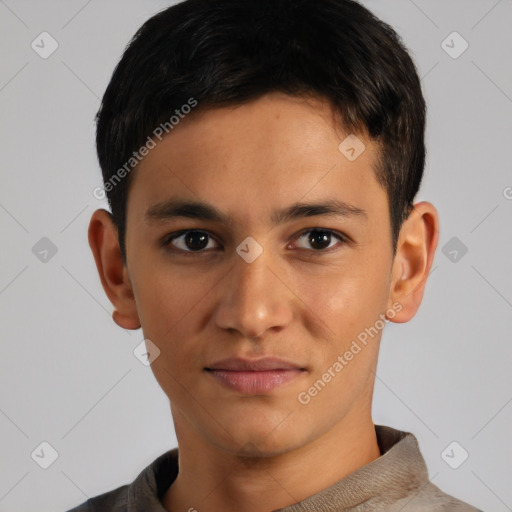 Joyful black young-adult male with short  brown hair and brown eyes