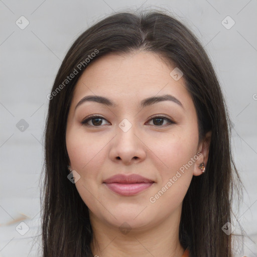 Joyful asian young-adult female with long  brown hair and brown eyes