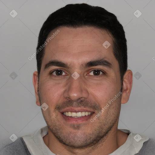 Joyful white young-adult male with short  black hair and brown eyes