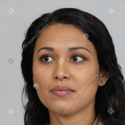 Joyful latino young-adult female with long  black hair and brown eyes