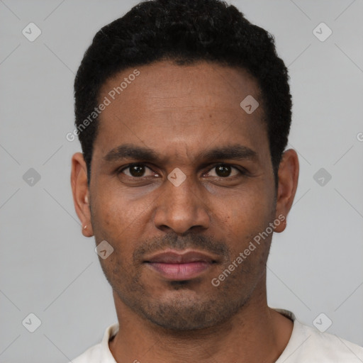 Neutral latino young-adult male with short  black hair and brown eyes