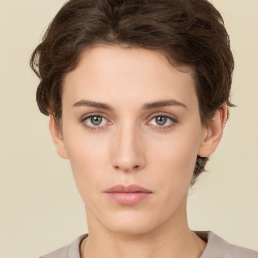 Neutral white young-adult female with short  brown hair and brown eyes