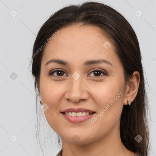 Joyful white young-adult female with medium  brown hair and brown eyes