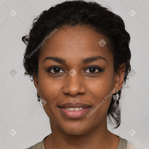 Joyful black young-adult female with medium  black hair and brown eyes