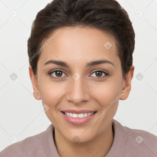 Joyful white young-adult female with short  brown hair and brown eyes