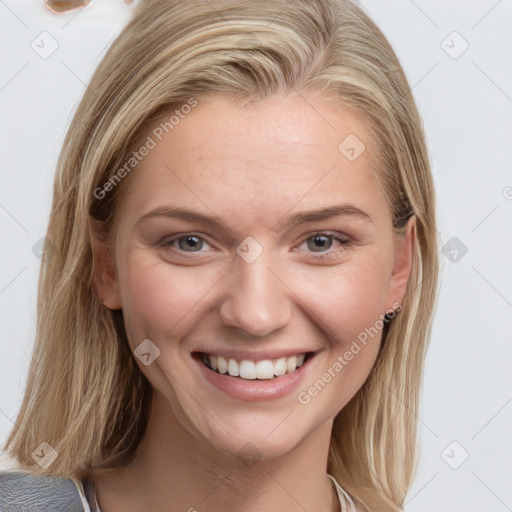 Joyful white young-adult female with medium  brown hair and blue eyes