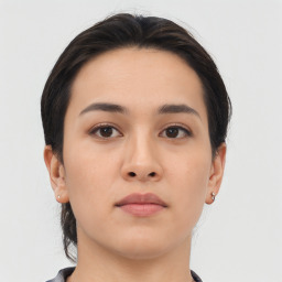 Neutral asian young-adult female with medium  brown hair and brown eyes