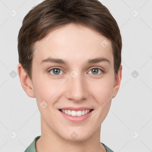 Joyful white young-adult female with short  brown hair and grey eyes