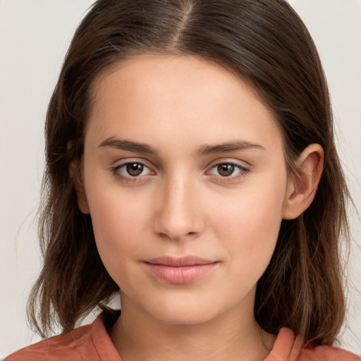 Neutral white young-adult female with medium  brown hair and brown eyes