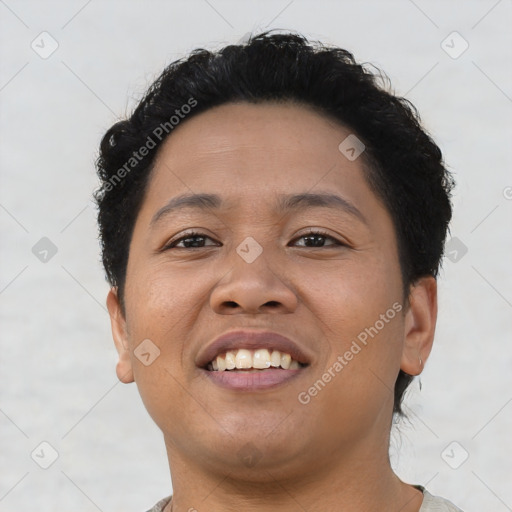 Joyful latino young-adult male with short  brown hair and brown eyes