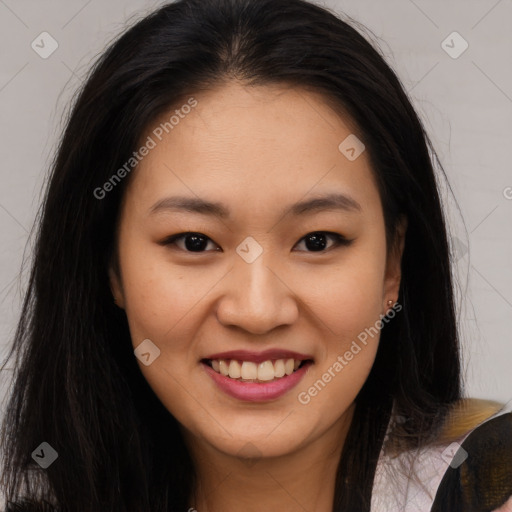 Joyful asian young-adult female with long  brown hair and brown eyes