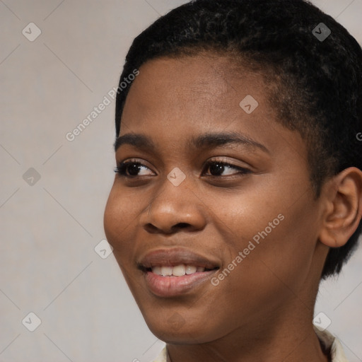 Joyful black young-adult female with short  black hair and brown eyes