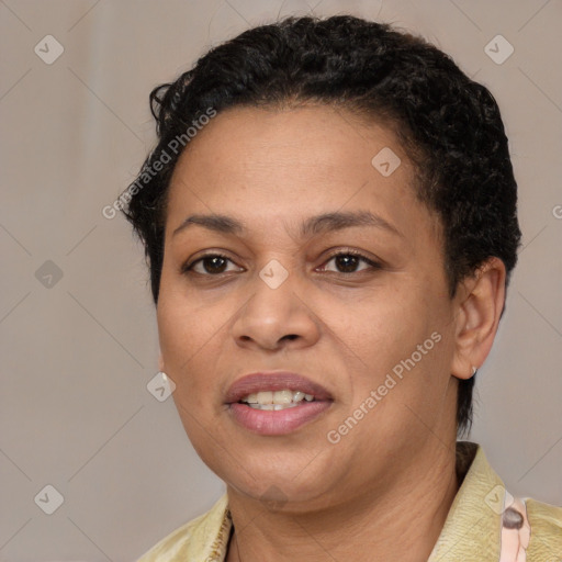 Joyful latino young-adult female with short  brown hair and brown eyes