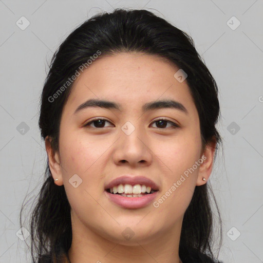 Joyful asian young-adult female with medium  black hair and brown eyes