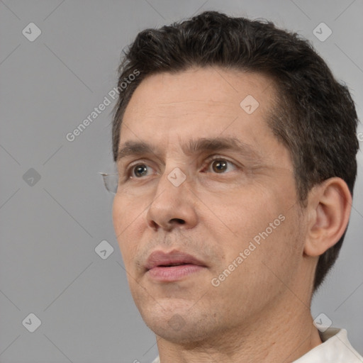 Neutral white adult male with short  brown hair and brown eyes