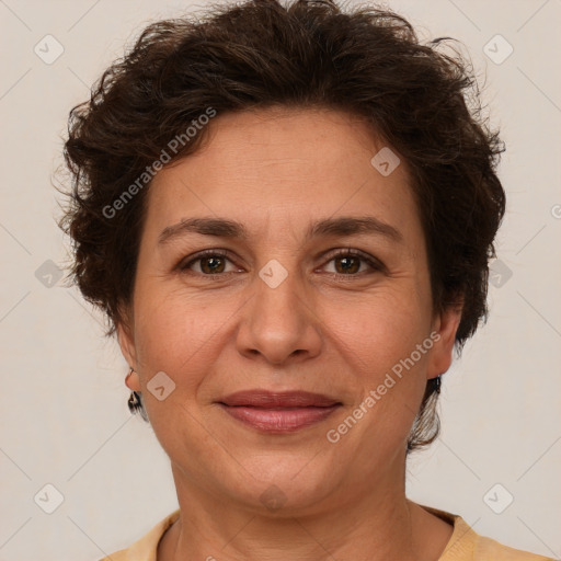 Joyful white adult female with short  brown hair and brown eyes